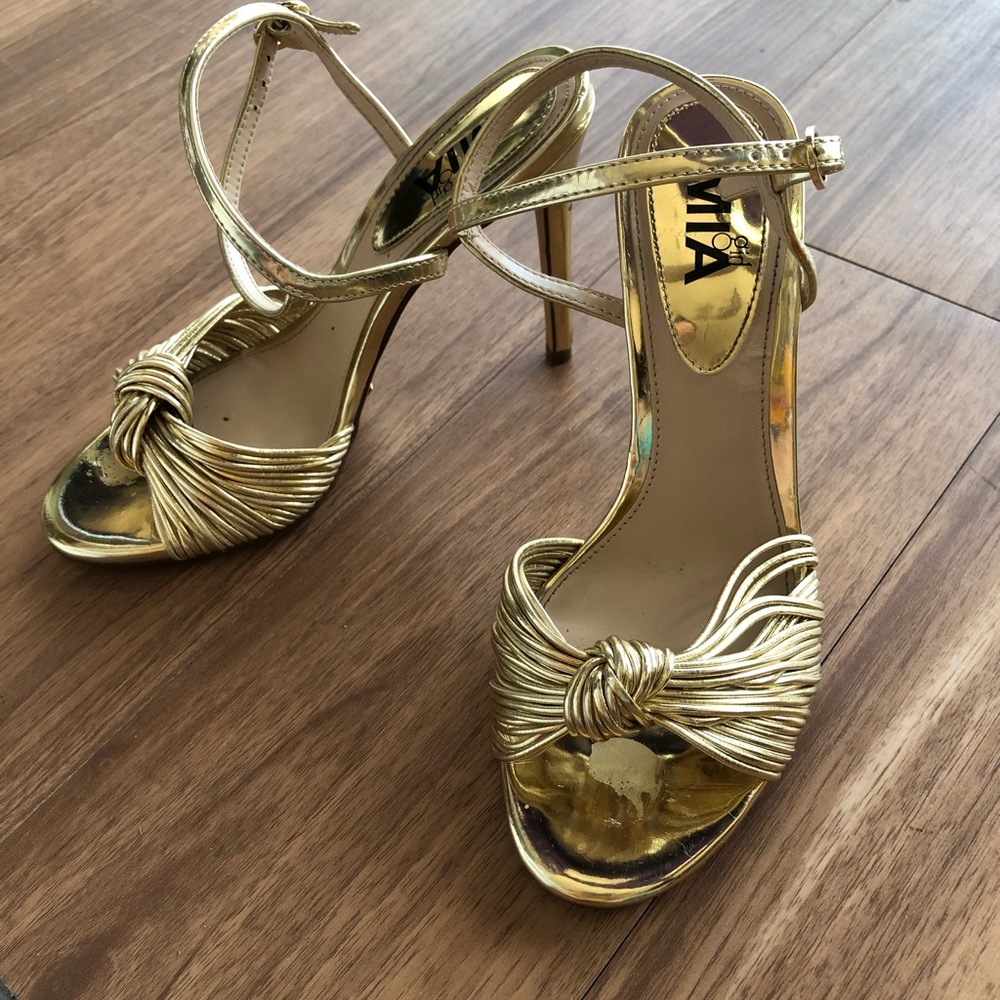 Gold high heels
